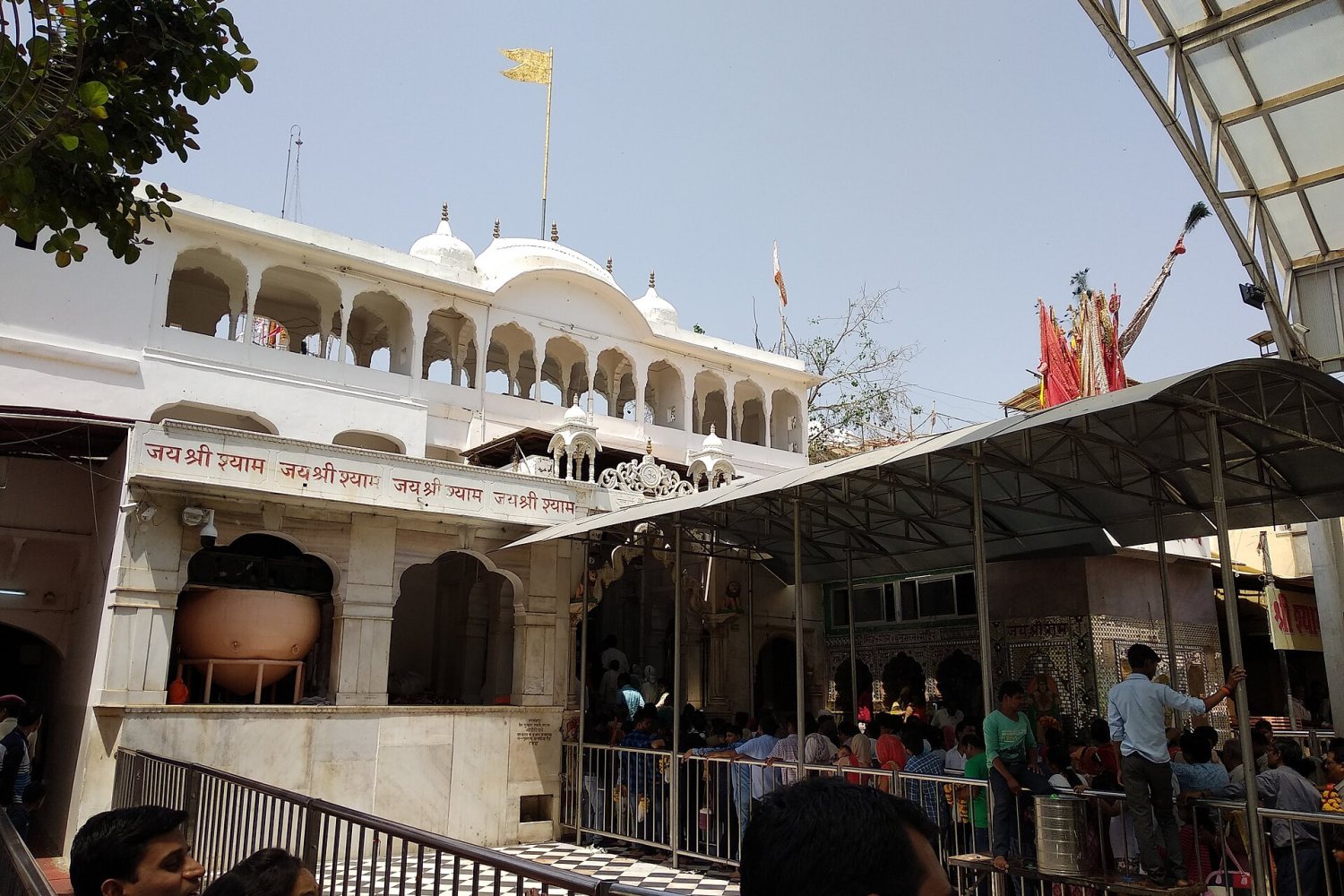 Devotees in the covered courtyard of the Khatu Shyam Ji temple